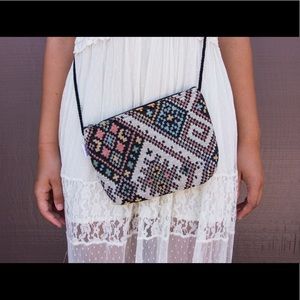 Clutch/crossbody bag. All 3 designs available :)